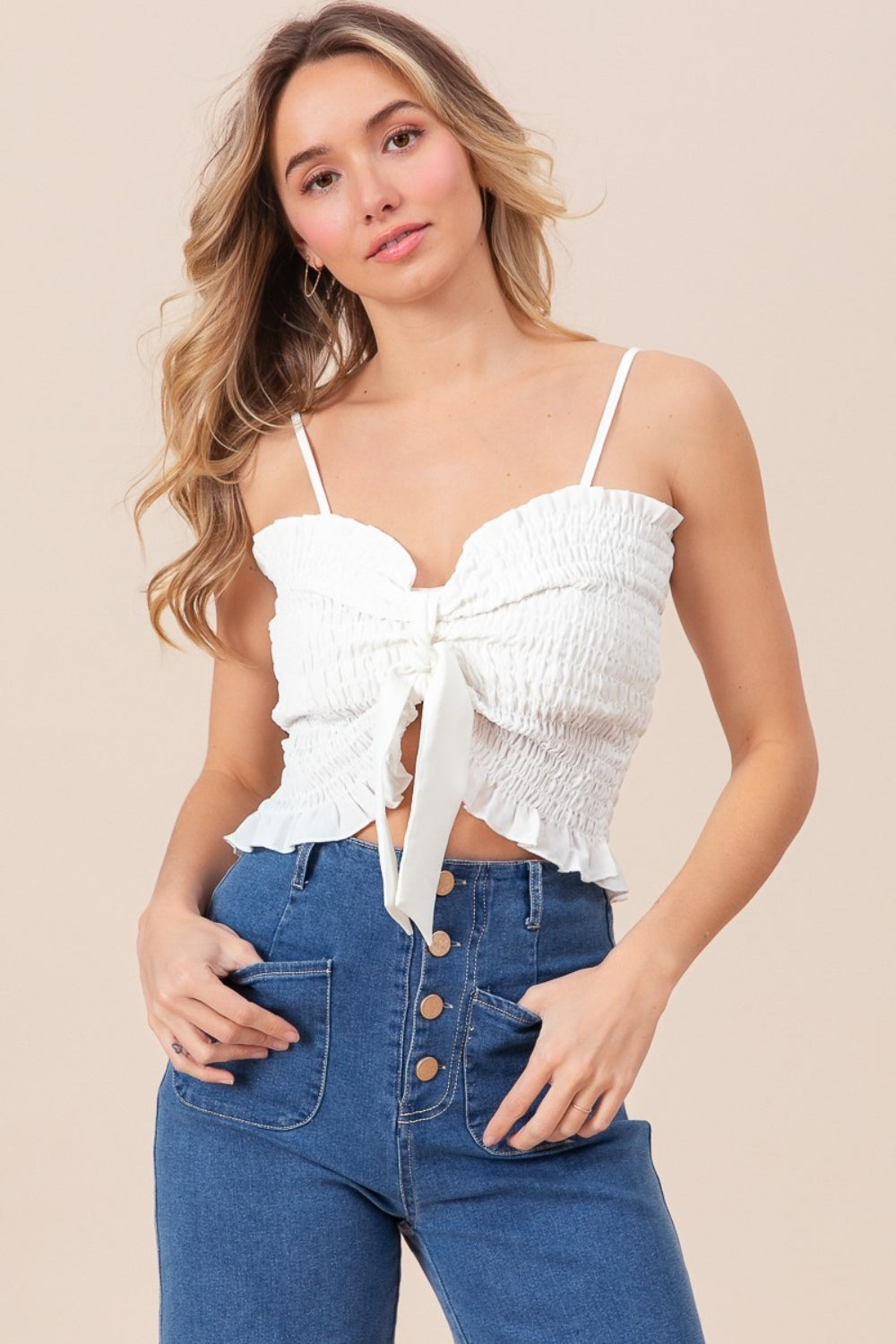 Sweetheart neckline cami spaghetti strap top with a bow