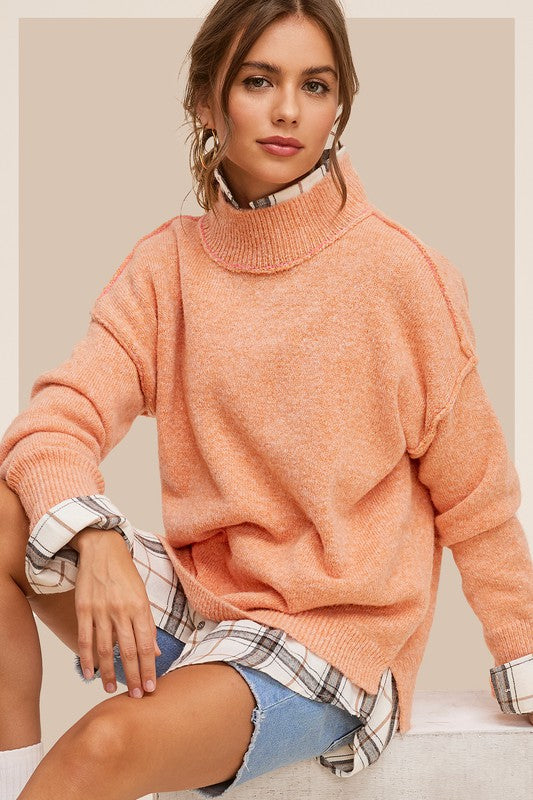 reverse seam soft sweater in pumpkin color for women