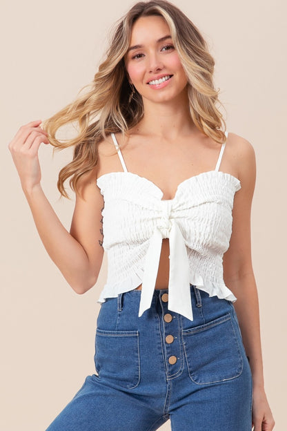 Sweetheart neckline cami spaghetti strap top with a bow